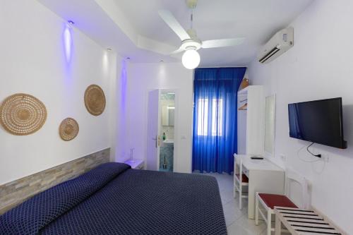 TV a/nebo společenská místnost v ubytování B&B Villa Passiaturo