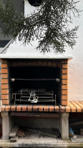 a bird house sitting on top of a bench at Torre Calera in Arganda del Rey