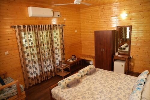 Cama o camas de una habitación en labdhi Resorts Masinagudi- Stag Groups not allowed
