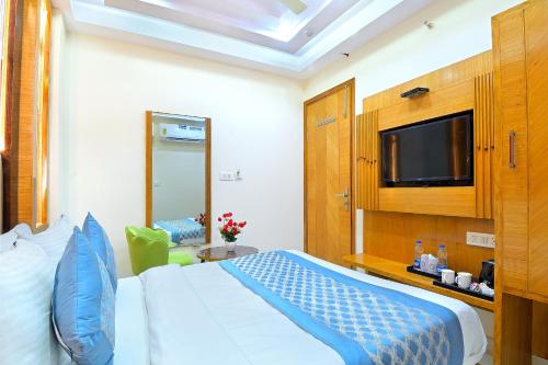 Katil atau katil-katil dalam bilik di Northern palace - 1 Min From Connaught Place & New Delhi Railway Station