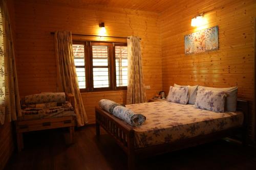 Cama o camas de una habitación en labdhi Resorts Masinagudi- Stag Groups not allowed