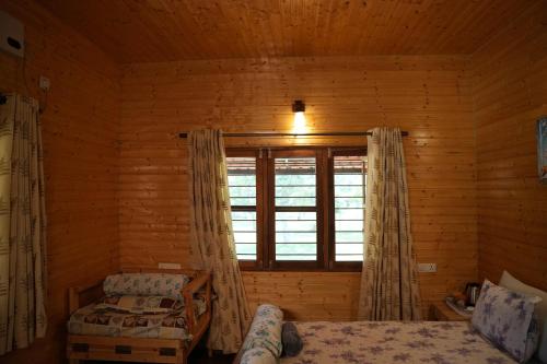 Cama o camas de una habitación en labdhi Resorts Masinagudi- Stag Groups not allowed
