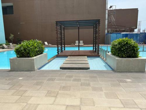 Πισίνα στο ή κοντά στο Dumaguete Condo with Wifi and Netflix