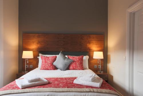 Кровать или кровати в номере Court Residence Aparthotel