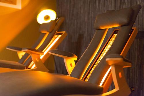 a row of chairs lined up in a row at Landhotel Anna in Sankt Martin am Tennengebirge