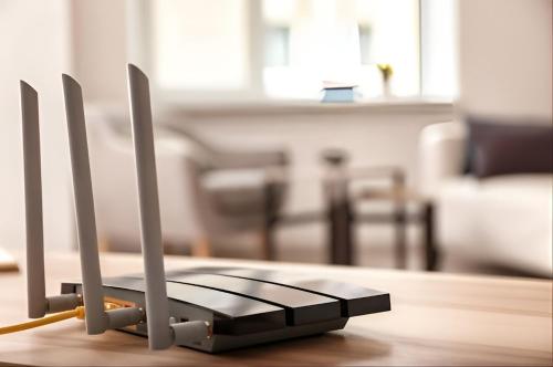 a router sitting on a table in a living room at Bright Stay Abu Dhabi in Abu Dhabi