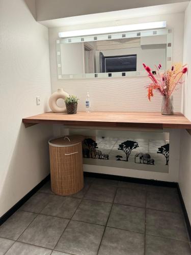 a bathroom with a sink and a mirror at BB Esbjerg in Esbjerg