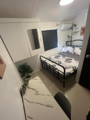 Ένα ή περισσότερα κρεβάτια σε δωμάτιο στο Eko's Crib Unit 49