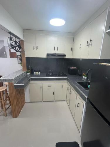 Dapur atau dapur kecil di Eko's Crib Unit 49