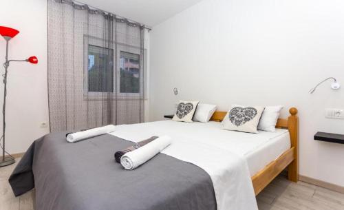 En eller flere senge i et værelse på Luxury suites Juricevic