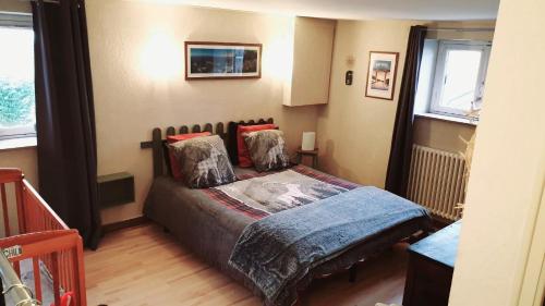 Postel nebo postele na pokoji v ubytování Apartment Les Claudalies