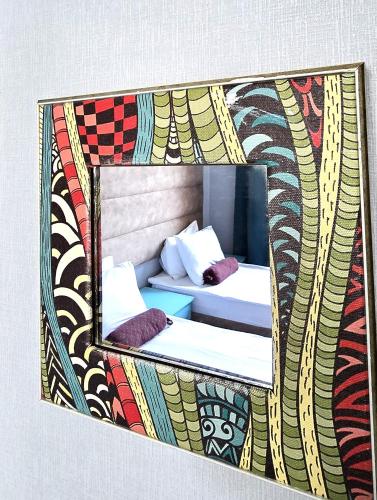 a picture of two beds in a room at Sahil İnn Hotel Formula 1 view in Baku