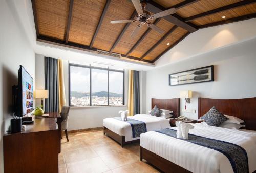 Ένα ή περισσότερα κρεβάτια σε δωμάτιο στο Lettry Hotel