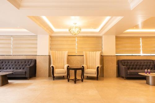 Posezení v ubytování Hotel Radhe Pride Hitech City