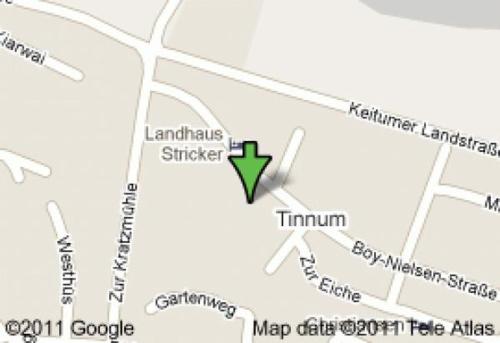 a map of lenarius street with a green arrow at Haus-Sonnenschein in Tinnum