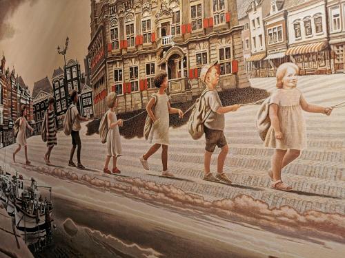 a painting of a group of children walking on a street at Hotel Parkzicht in Valkenburg