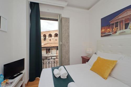 Postel nebo postele na pokoji v ubytování Romulus Rooms