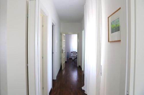 Ένα ή περισσότερα κρεβάτια σε δωμάτιο στο Casa Primavera