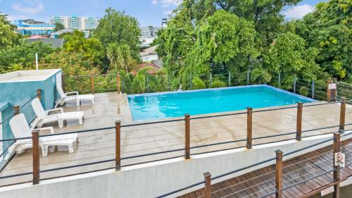 a swimming pool on the roof of a house at leroy place in Kingston