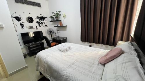 Postel nebo postele na pokoji v ubytování XD Cozy Apartments