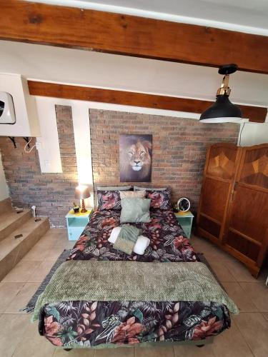 Ένα ή περισσότερα κρεβάτια σε δωμάτιο στο Tehillah Guesthouse