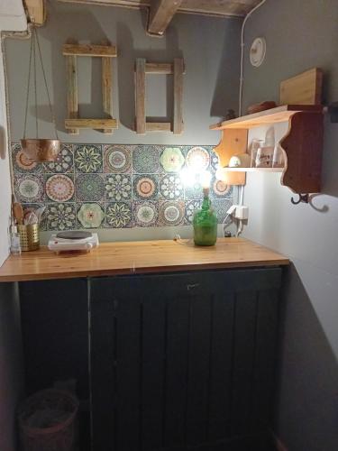 a kitchen with a counter with a light on it at Experience accommadation Eco-Unela in Rovaniemi
