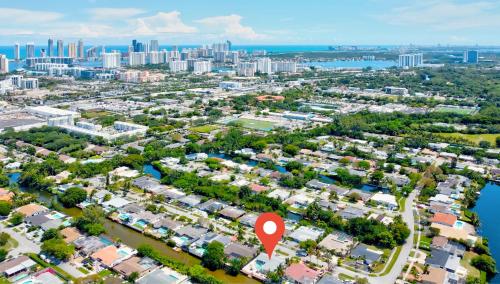 an aerial view of a city with a red marker at Oasis Miami Villa Pingpong 10Mn from Beach in Miami