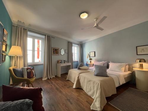 Postel nebo postele na pokoji v ubytování Matteotti 2 Apartment