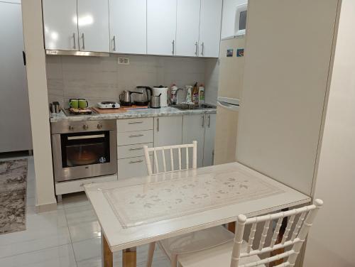 Kuchyň nebo kuchyňský kout v ubytování Maxima Apartment