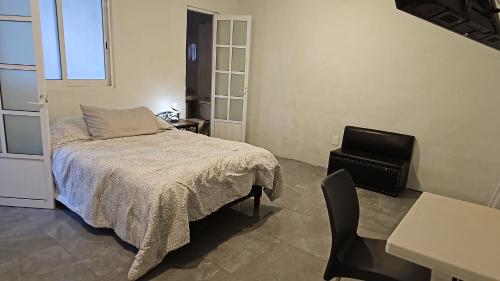 Postel nebo postele na pokoji v ubytování Casa Cachi