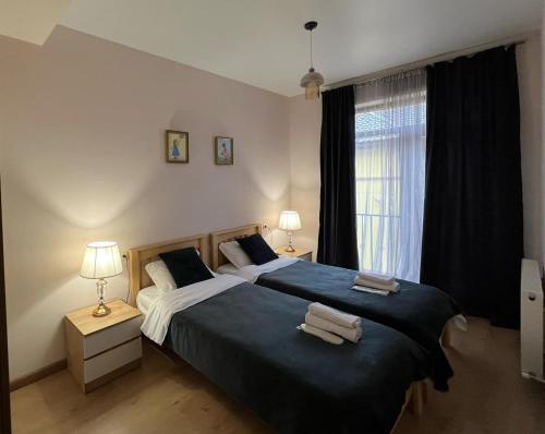 Una cama o camas en una habitación de Sunny Villa 2