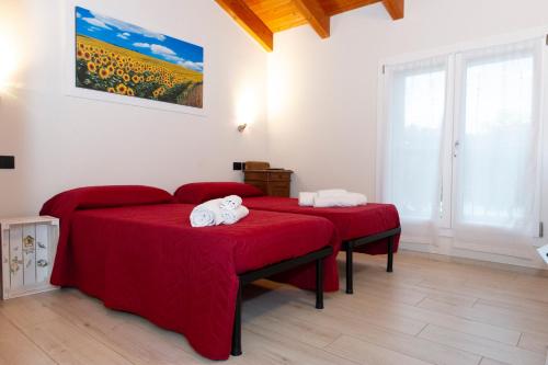 Кровать или кровати в номере La collinetta B&B