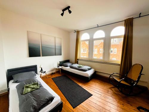 Postel nebo postele na pokoji v ubytování Ferienwohnung zur Altstadt