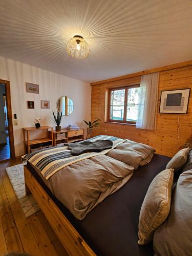 Ένα ή περισσότερα κρεβάτια σε δωμάτιο στο Marianne - Alpine Apartments