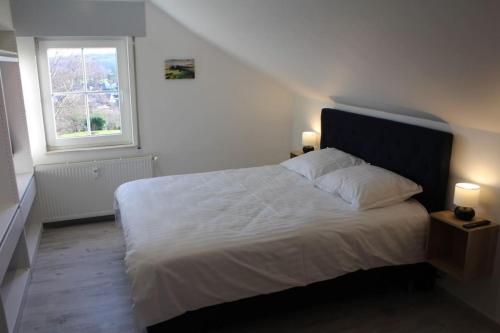 Una cama o camas en una habitación de Eaglenest