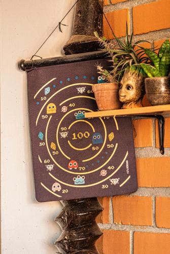 a sign on the side of a wall at Huacachina Desert House in Ica