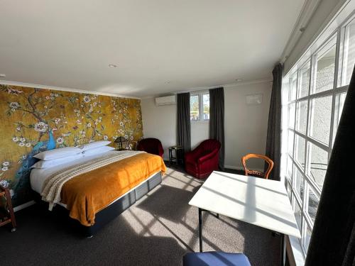 Postel nebo postele na pokoji v ubytování Art Deco BNB