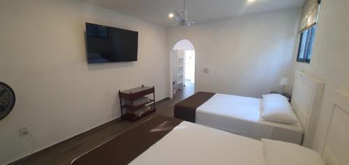 Hotel Casa Piñónにあるベッド