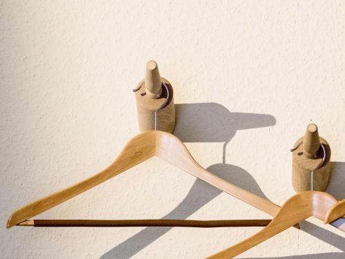 a wooden rack with three wooden toy animals on it at Webers "alte Backstube" in Friedrichshafen