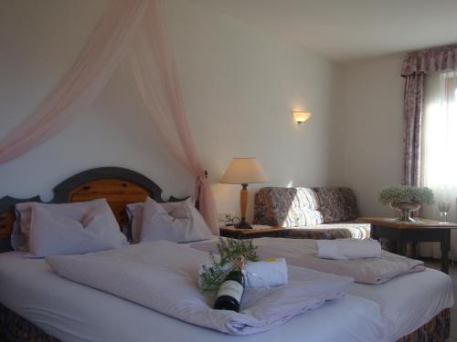 Ένα ή περισσότερα κρεβάτια σε δωμάτιο στο Hotel White Mountain