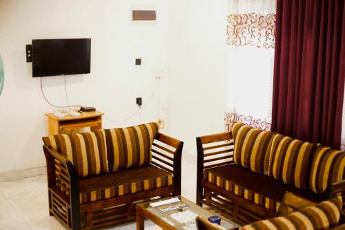 TV a/nebo společenská místnost v ubytování Coastal House