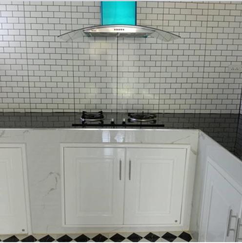 Kuchyň nebo kuchyňský kout v ubytování PLUEMCHAI Home