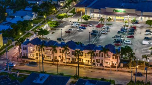 an aerial view of a parking lot in front of a hotel at Modern City Loft in Downtown River District in Fort Myers