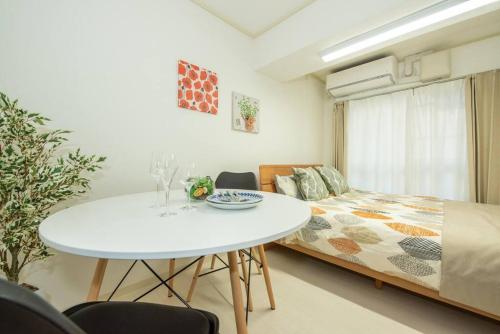 Sapporo Daily Apartment コーポハシモトにあるベッド