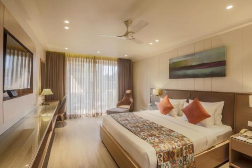 Postel nebo postele na pokoji v ubytování Resort De Coracao - Calangute , Goa