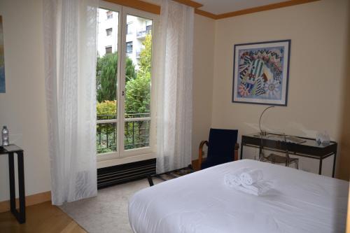 Posteľ alebo postele v izbe v ubytovaní La Villa d'Auteuil, Paris 16, rénovée