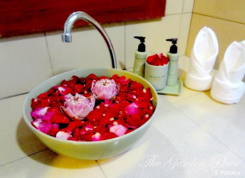 a bowl filled with valentines hearts on a counter at The Garden Place Pattaya in Pattaya Central