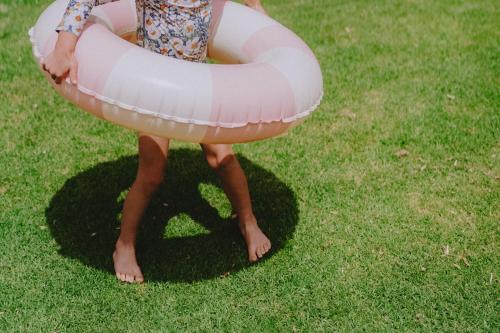 a young child is standing in an inflatable at Mulwala Resort in Mulwala