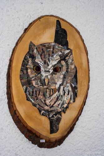 a painting of a cat on a wall at Apartment Pohar in Log pod Mangartom