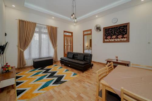 Гостиная зона в Villa D'Maguwo Suites